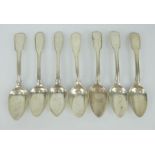 Seven 19th century silver fiddle and thread table spoons. Various makers, hallmarked London 1825,