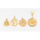 A collection of four gold pendants. Featuring two 9ct gold St Christopher pendants, a 9ct gold