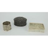 Continental Repousse silver trinket box, Cambodian white metal box and Indian kutch napkin ring