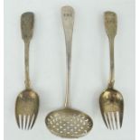 Two William IV silver fiddle pattern pickle spoons and a George III pierced silver sugar sifter