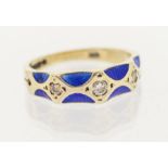 A 9ct white gold diamond and blue guilloche enamel ring. Estimated total diamond weight 0.16