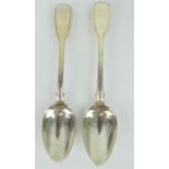 Pair George IV silver serving spoons with arm and cutlass crest. Hallmarked London 1826 & 1831