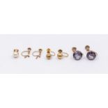 A collection of "9ct" stamped screwback earrings, featuring a pair of synthetic colour change