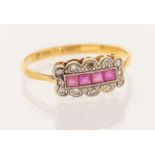 An early 20th century ruby and diamond dress ring. Stamped "18ct Plat" to the shank. Size P. Gross