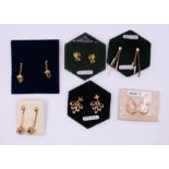 A collection of six 9ct gold hallmarked earrings. To include a pair of lantern earrings. Approximate