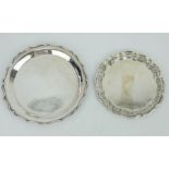 Two silver card trays, both marked STERLING. Largest 21cm diameter. Gross weight 558 grams