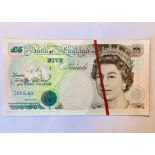 A collection of banknotes, share certificates, indentures and coins, to include a rare error note (