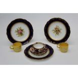 Three early 20th century Coalport florally decorated dessert plates, each with bleu de Roi border,