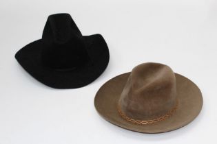 American Hat Co, Houston, Texas. A black felt stetson, US size 7 1/4, together with another,