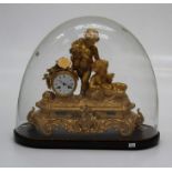 A 19th century French gilded spelter mantle clock, cast with Bacchanalian putti and drum head case