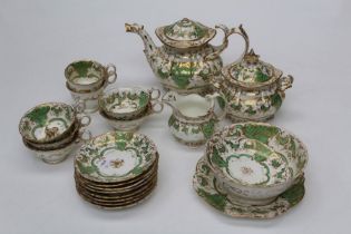 An early Victorian part tea service of Rockingham style, twenty eight pieces, apple green and