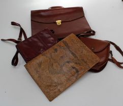 A small collection of four various vintage handbags, a briefcase and a python skin large holdall