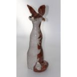 Jennie Hale ( 20th century British) A large crackle glazed ceramic model of a tan and white fox,