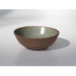 Bernard Leach ( 1887-1979)A stoneware bowl, circa 1965 with celadon glazed interior. Impressed mark,