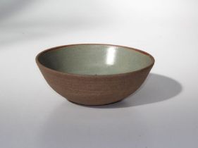 Bernard Leach ( 1887-1979)A stoneware bowl, circa 1965 with celadon glazed interior. Impressed mark,
