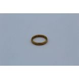 A 22ct gold wedding band, 4.5 gm approximately