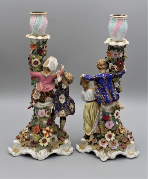 A pair of 19th century Derby porcelain figural candlesticks, each modelled with a young boy and girl - Image 3 of 5