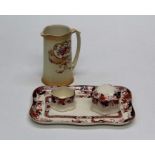 A Derby Crown Ware Imari pattern dressing table tray, two conforming boxes and a Devon type water