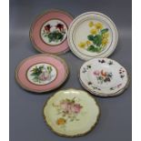 A Royal Crown derby plate, decorated with pink and yellow roses on a lemon and gilded ground,