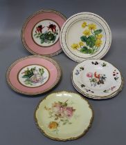 A Royal Crown derby plate, decorated with pink and yellow roses on a lemon and gilded ground,