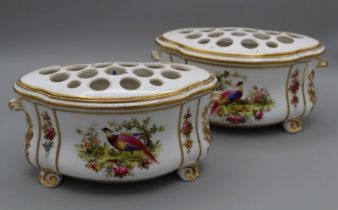 A pair of 20th century Crown Staffordshire posy holders, each of shaped oval form, polychrome
