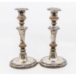 A pair of late 19th Century silver plated candlesticks (wear to plate)