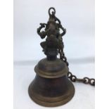 Collection of three Indian bronze items to include a bronze hanging bell and two bronze figure of