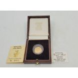 An Elizabeth II 1987 10 pounds Britannia 1/10oz. proof gold coin, rev. Britannia standing by