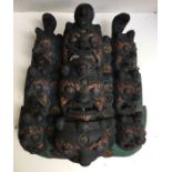 A Sino-Tibetan carved wood wall hanging H:48cm