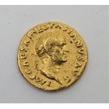 Roman gold coin: An Aureus of Vespasian, struck A.D. 70 in Rome, obv. laureate bust of Vespasian