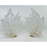 A pair of Lalique clear and frosted crystal "Champs Elysees" sconce wall lights, inspired by the