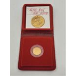 An Elizabeth II 1980 proof half sovereign gold coin, in capsule and Royal Mint case of issue.