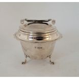 An unusual silver sugar bowl with the cover incorporating sugar nips, by John Turton & Co, Sheffield