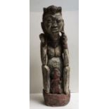 A large Asian carved wood figure. H:69cm