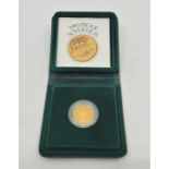 An Elizabeth II 1980 proof sovereign gold coin, in capsule and Royal Mint case of issue.