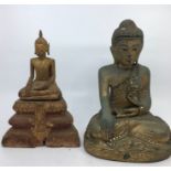 Two carved wood figures of Buddha. (2) H:26cm