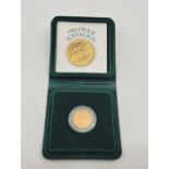 An Elizabeth II 1980 proof sovereign gold coin, in capsule and Royal Mint case of issue.