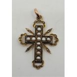 A Victorian precious yellow gold crucifix pendant, set split pearls within dark blue enamel border