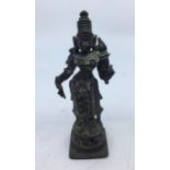 An Indian bronze figure of a deity. H:11.5cm