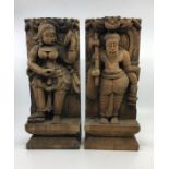 Two Indian carved wood figures of deities. H:35cm