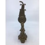 An Indian bronze lamp. H:23.5cm