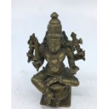 An Indian bronze figure of a deity. H:8.6cm