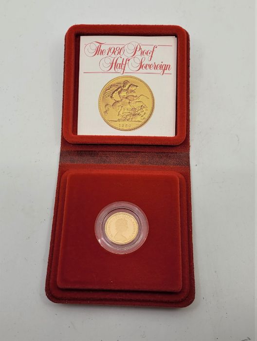 An Elizabeth II 1980 proof half sovereign gold coin, in capsule and Royal Mint case of issue.