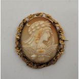 A late 19th century precious yellow metal mounted oval shell cameo brooch, possibly depicting