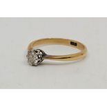 An 18ct gold diamond solitaire ring, set single round brilliant cut diamond (EDW 0.30 carats),