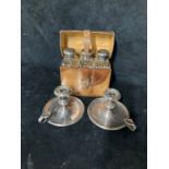 Set of three Glass flasks with Silver Hallmarked lids in a tan leather case and two Silver Candle