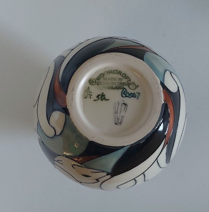 A Boxed Moorcroft vase titled  " Artic Fox"  it is decorated with a banded group of white artic - Image 5 of 5