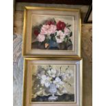 Two framed oils of studies of flowers in a vase, both signed
