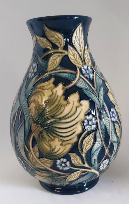 A boxed Master, Pimpernel Perfection Vase. Decorated with leaves and flowers in greens and blues,