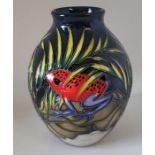A boxed trial piece Moorcroft vase, decorated in the Poison Dart Frogs pattern , decorated with 3